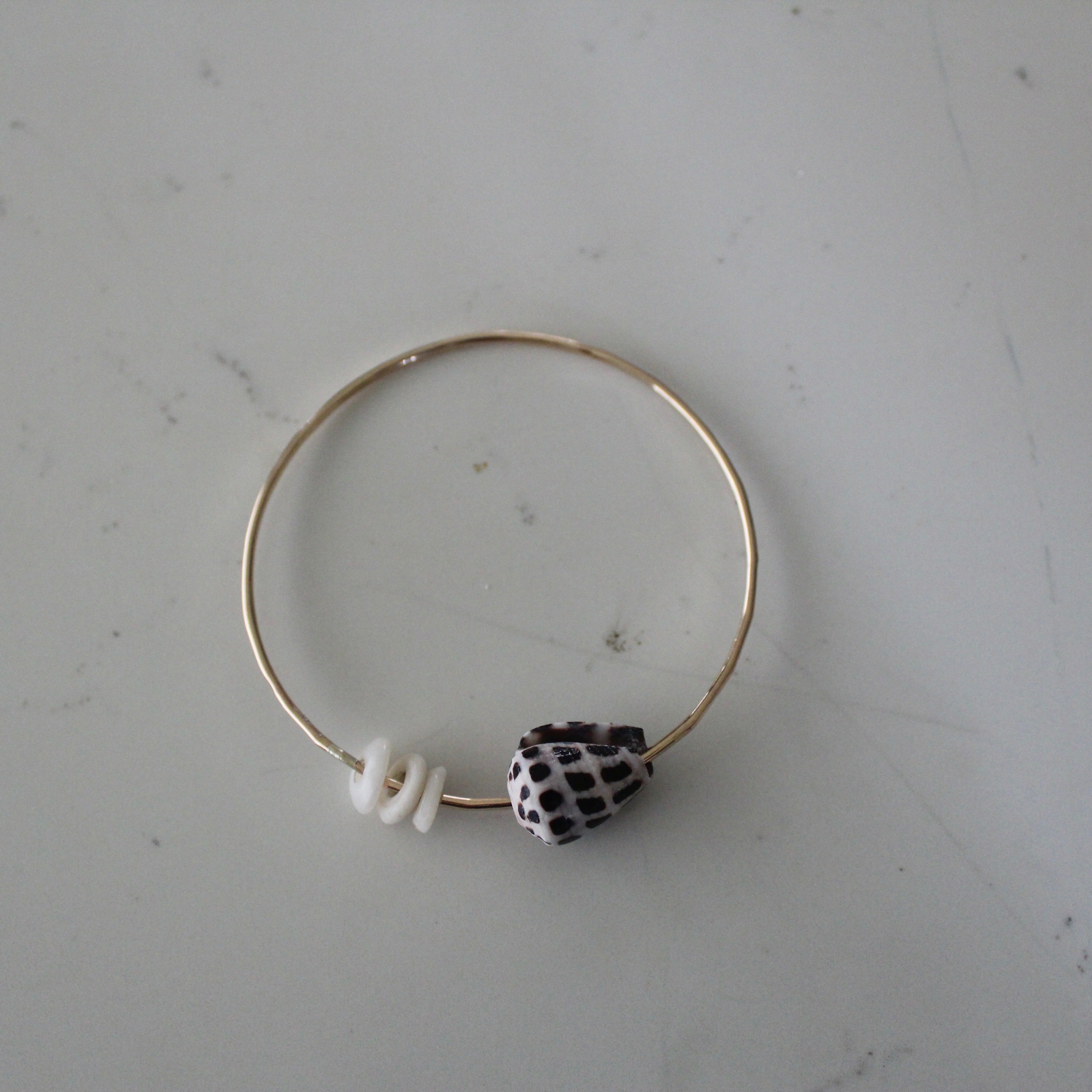 HEBREW CONE SHELL + PUKA SHELLS BANGLE SIZE 7.5
