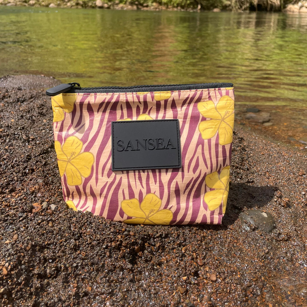 SANSEA TRAVEL POUCH IN GOLDEN HIBISCUS