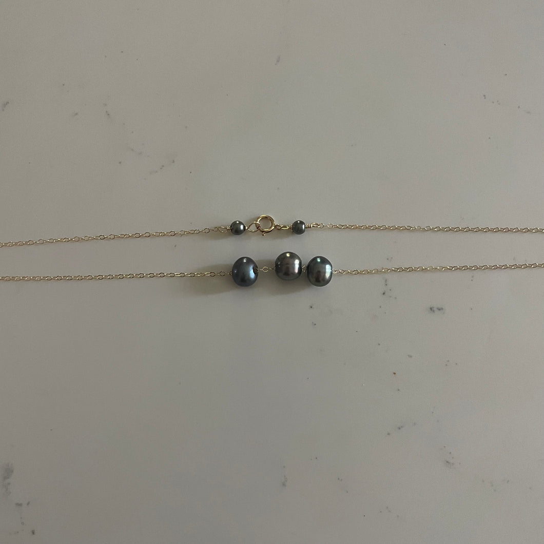 FLOATING TRIPLE PEARL NECKLACE