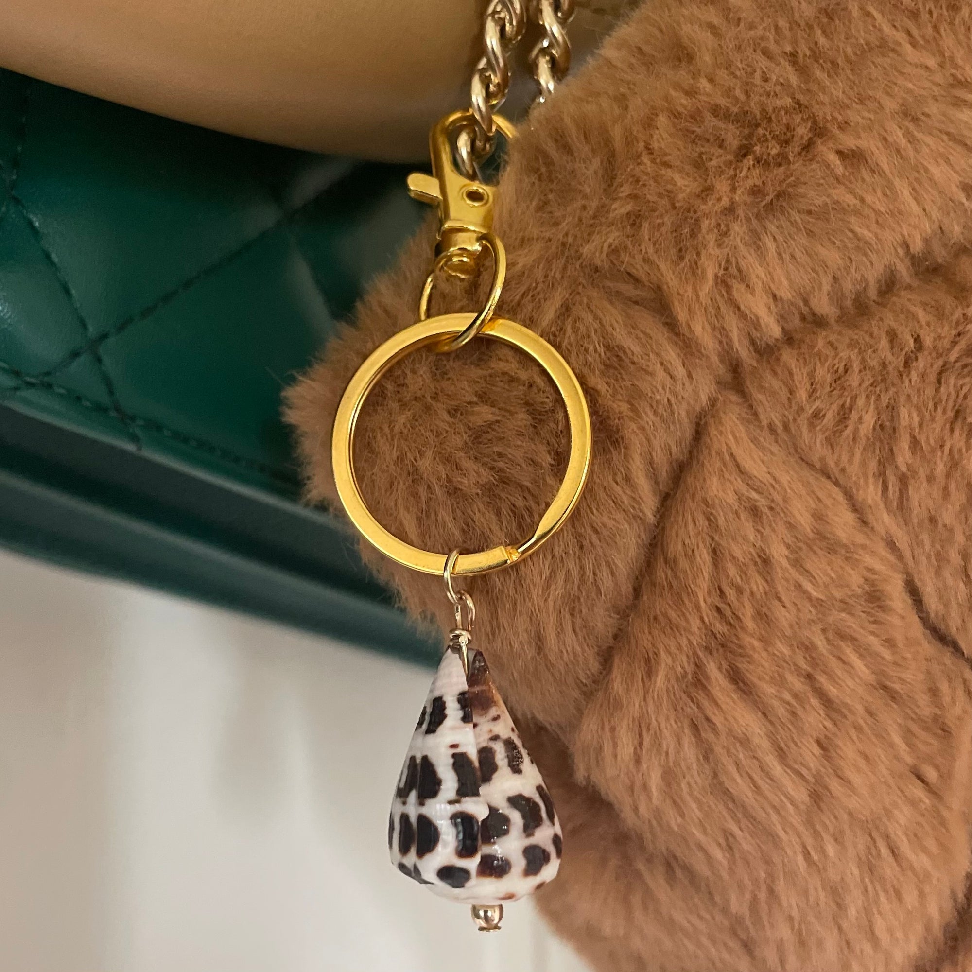 GOLD HEBREW CONE SHELL KEYCHAIN