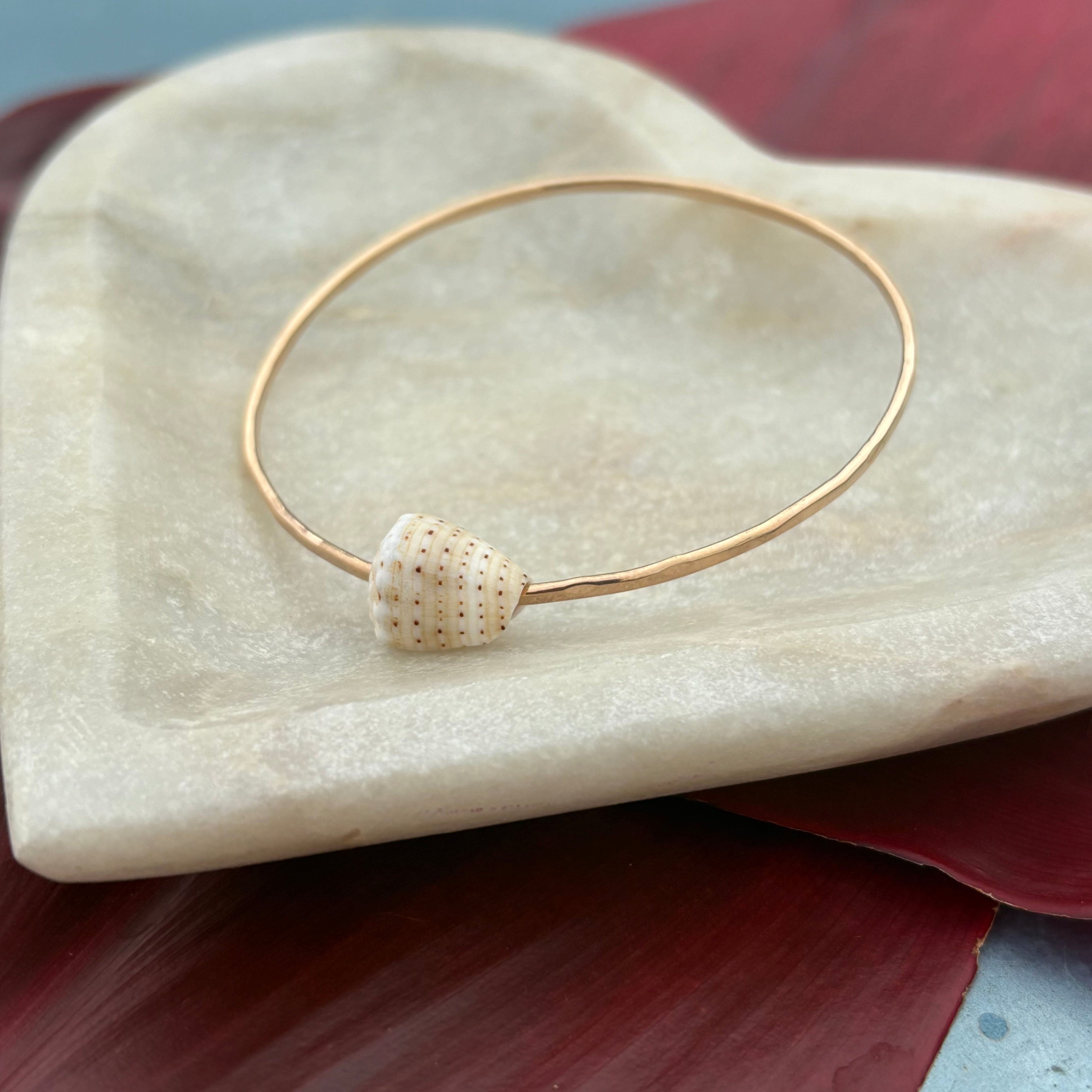 ABBREVIATED CONE SHELL BANGLE SIZE 7