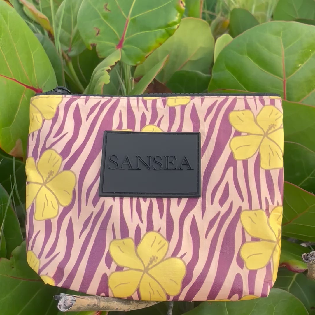 SANSEA TRAVEL POUCH IN GOLDEN HIBISCUS
